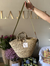 Straw bag with colored shoulder strap